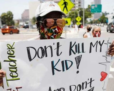 半个月近10万美国儿童确诊 白宫仍强推返校上课遭抗议